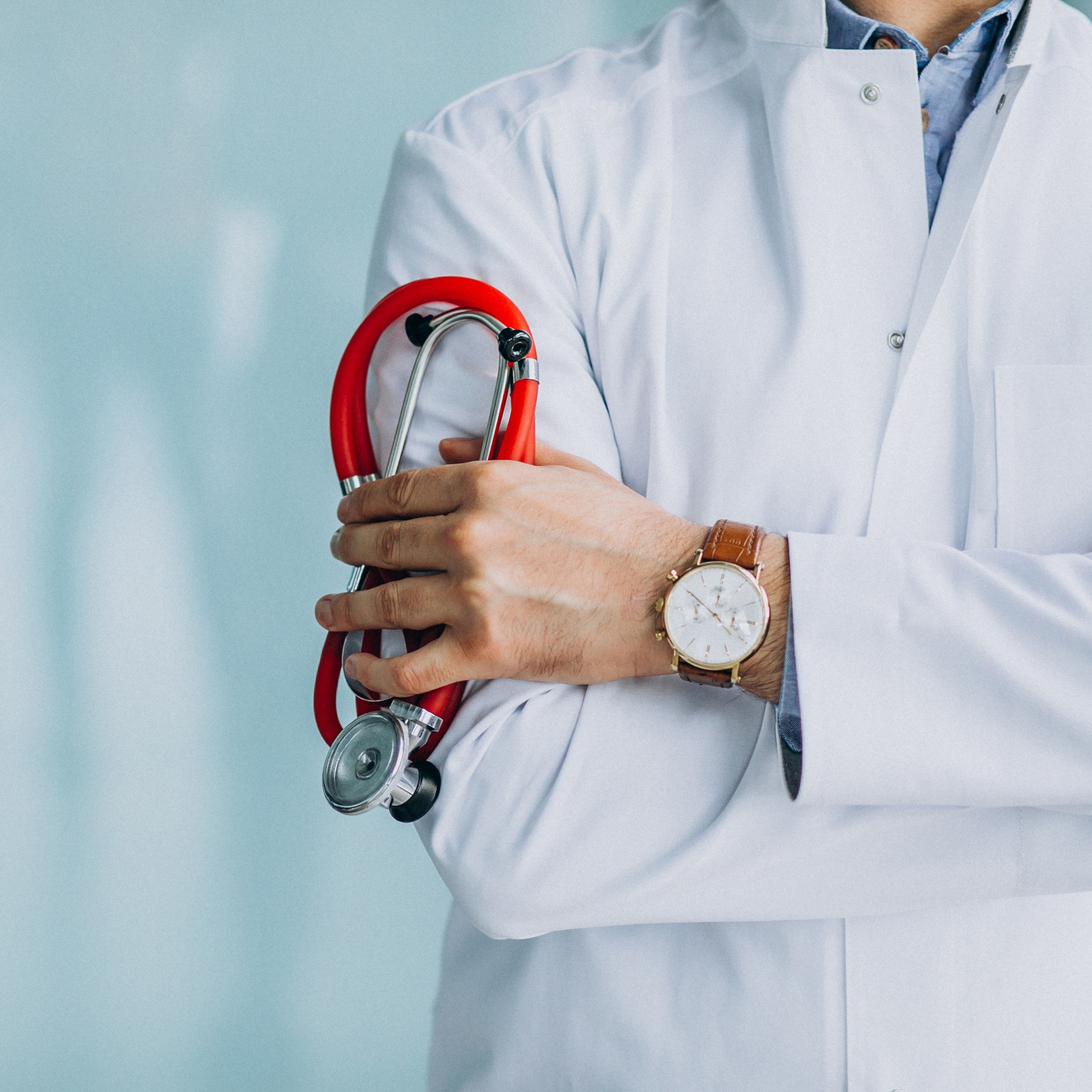 young handsome physician medical robe with stethoscope